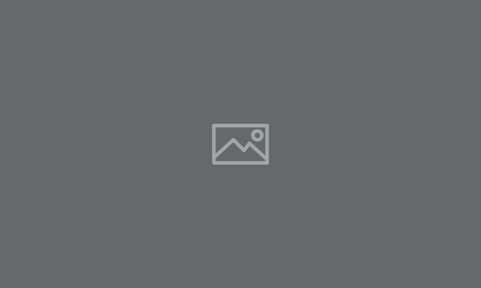 Gray background with a centered placeholder image icon.