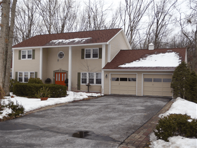 Two story residential home with new siding in State College, PA