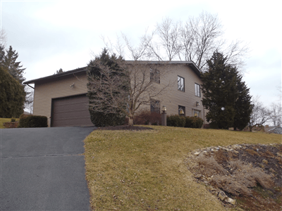 Residential seamless gutter installation in State Park, PA