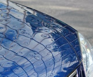 Car Hood With Dents  — Columbus, OH — Kraft’s Body Shop