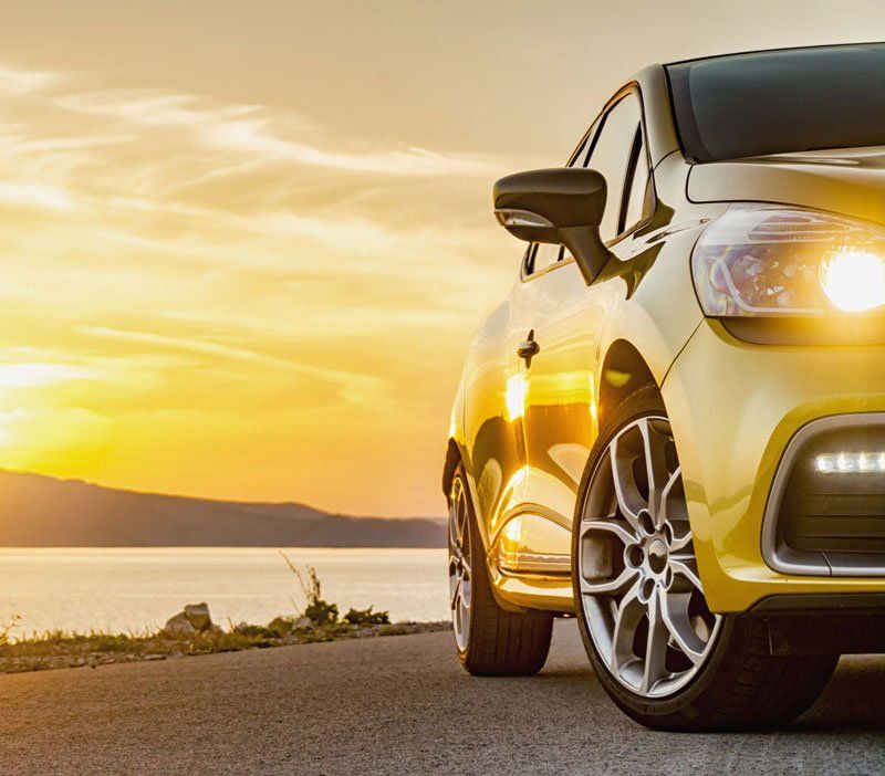 Car parked in the sunset