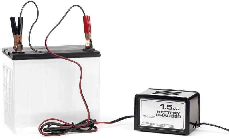 Car battery connected to a charger