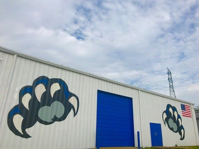 Wildcat Warehouse — White Container with Wildcat Logo in Lexington, KY