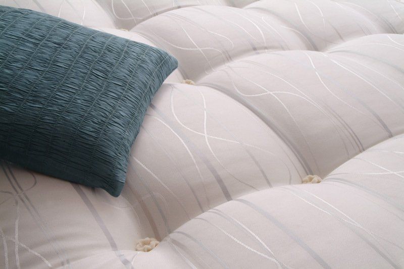 Surface of a bed in Taylor’s Furniture Stores
