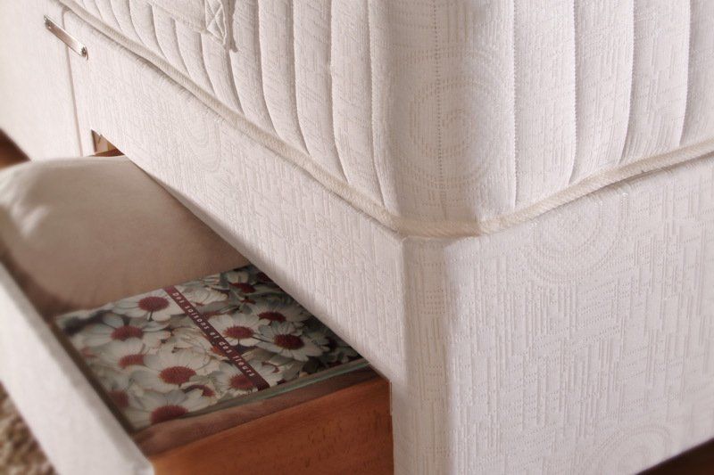 Bed with the drawer open in Taylor’s Furniture Stores