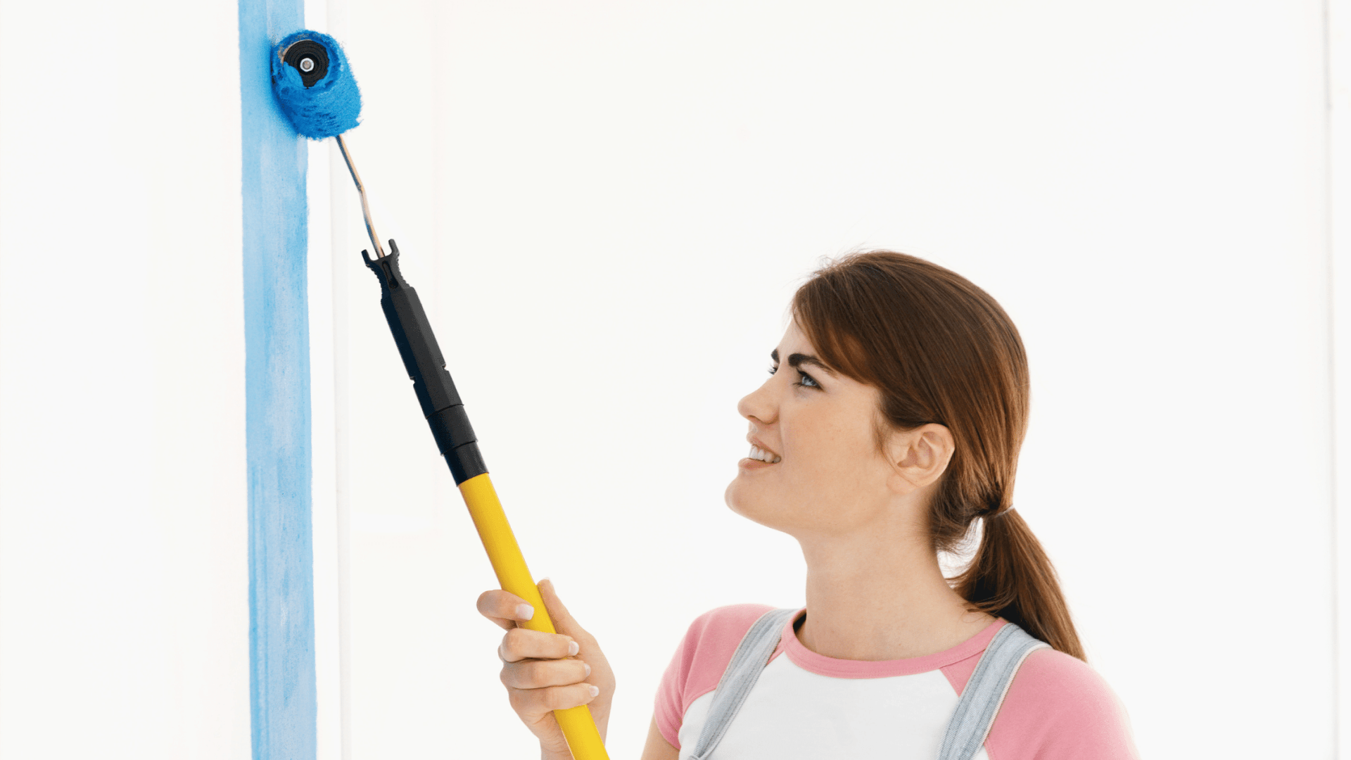 Rolling paint onto a wall