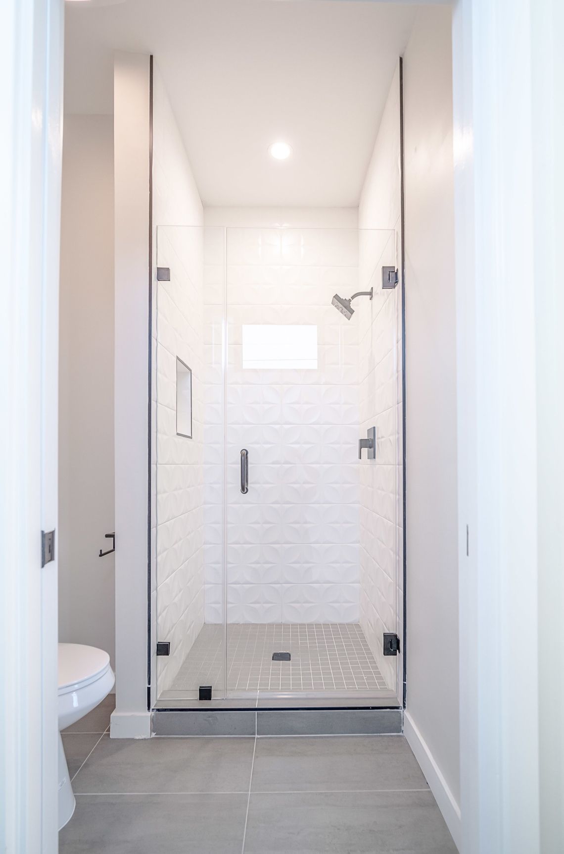 The shower in the private, ensuite, full bathroom in the master bedroom of an accessory dwelling unit (ADU).