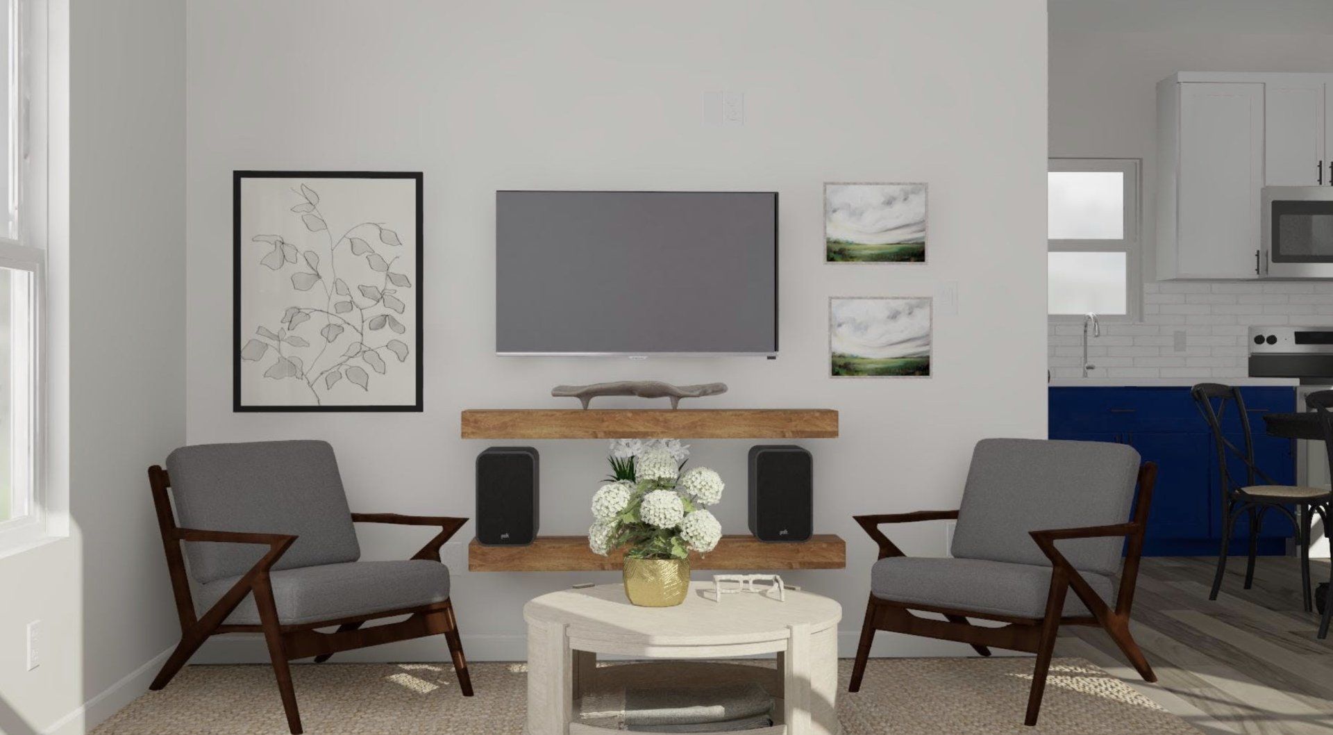 A living room in an accessory dwelling unit (ADU) granny flat with two chairs, a coffee table, and a flat screen tv.