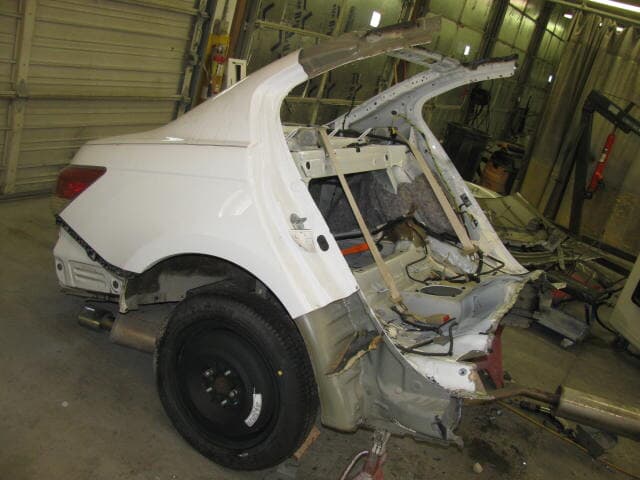 auto repairs — Repairing a damaged car in Louisville, KY
