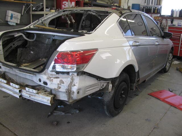 auto shop repair — Car being repaired in Louisville, KY