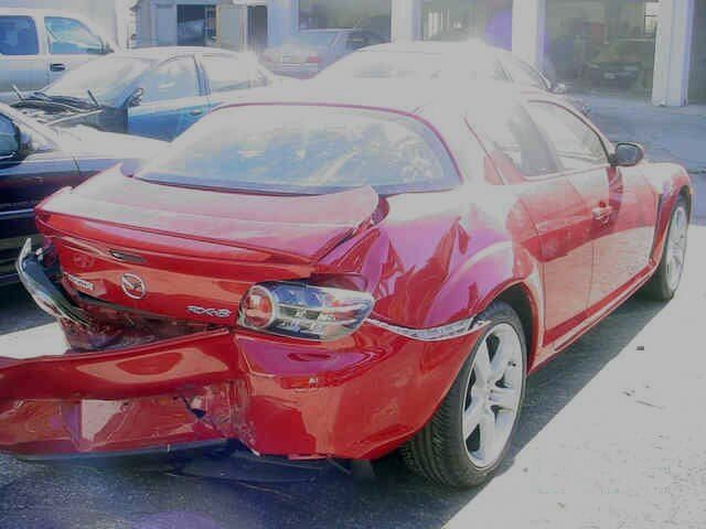 Car Problems — Red Car Damaged in Louisville, KY