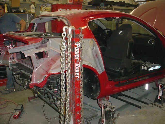 car repair services — Fixing Red RX8 in Louisville, KY