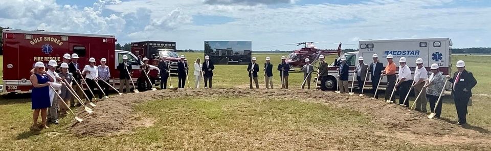 Local government and hospital officials at a groundbreaking for a freestanding emergency room in Gulf Shores, Alabama.