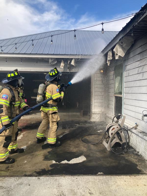 Orange Beach, Alabama, firefighters at the scene of a Terry Cove fire on Feb. 8.