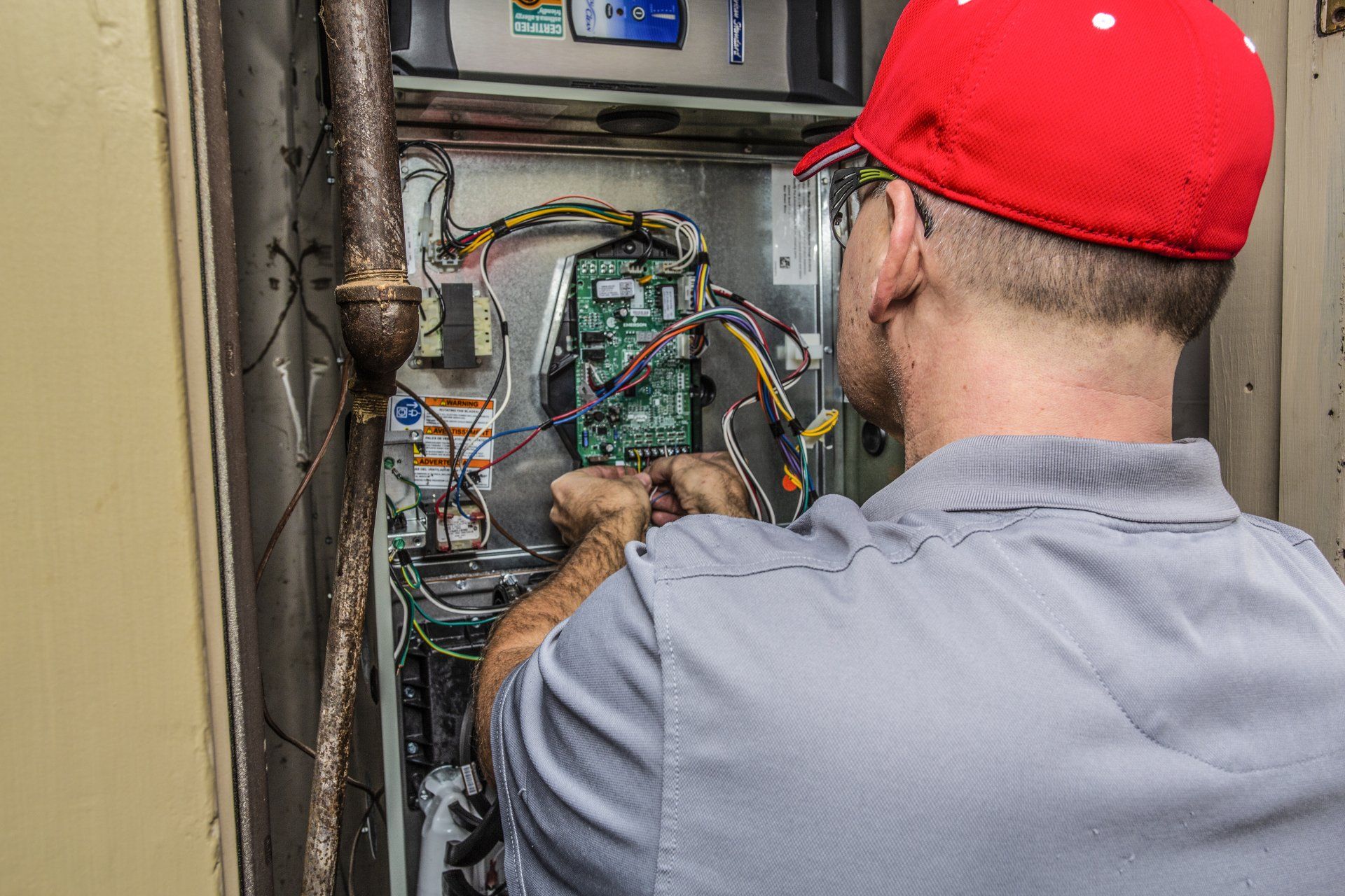 man fixing electrical