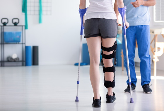 Orthopedic Surgeon — Woman Doing Some Therapy in Lake Success, NY Orthopedic Surgeon — Woman Doing Some Therapy in Lake Success, NY