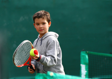 Football Injury — Little Kid Playing Tennis in Lake Success, NY Football Injury — Little Kid Playing Tennis in Lake Success, NY