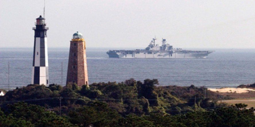Lighthouse with Freighter