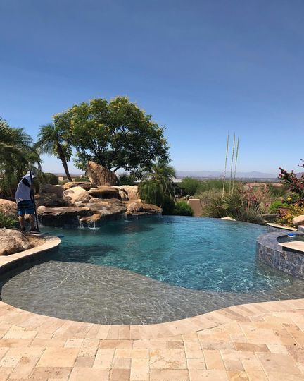 infinity pool with a tree in scottsdale