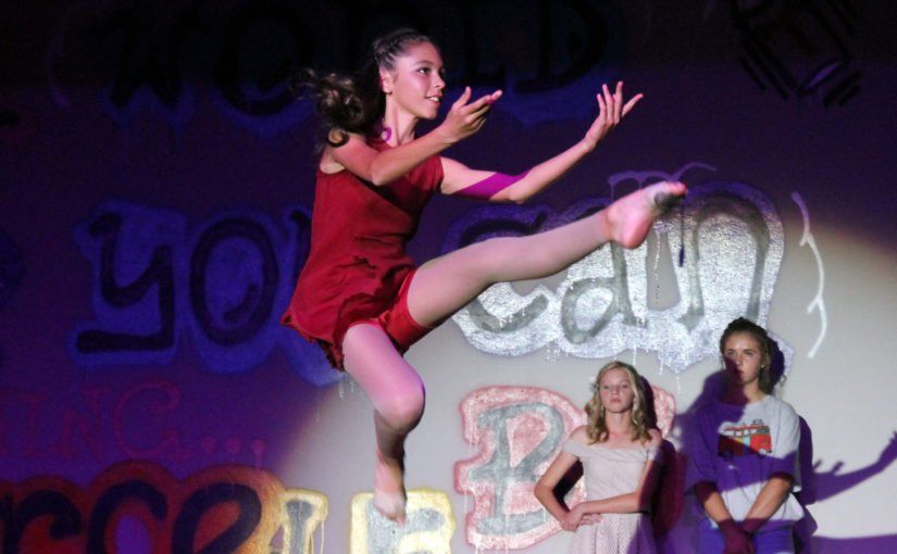 trinity little falls student at a talent evening