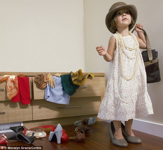 Child in adult clothes