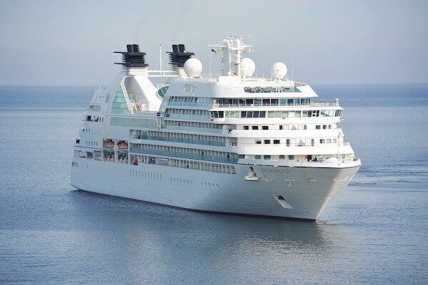 limo transportation service for Seattle cruise ships A large white cruise ship is floating in the ocean