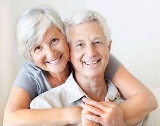 Senior Couple Embracing — Cañon City, CO — Commstar Alarms Senior Couple Embracing — Cañon City, CO — Commstar Alarms