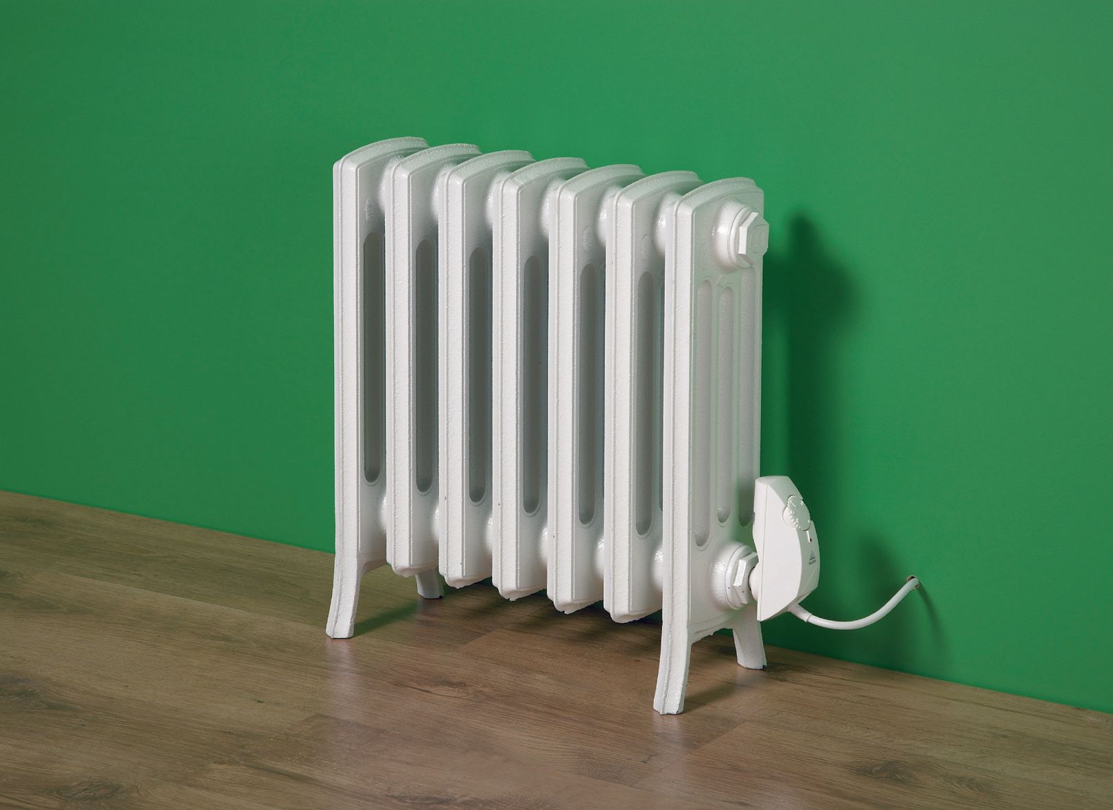 Electric Etonian cast iron radiator Electric Etonian cast iron radiator in white