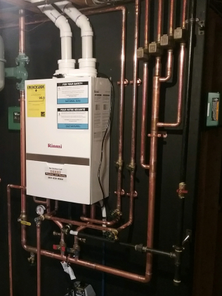 Side View Heating System Installation | Derry, NH | Derry Plumbing & Heating