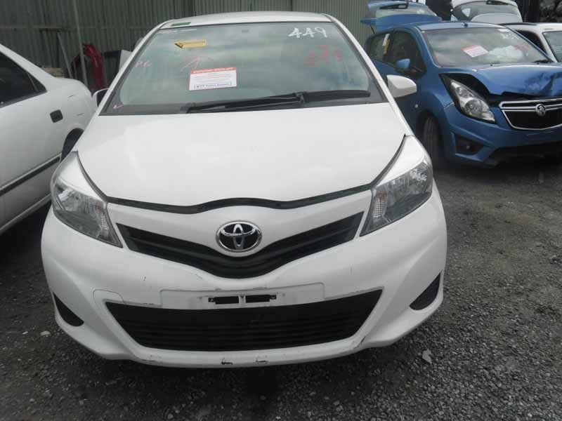 front of white car
