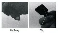 A black and white photo of a halfway and tap