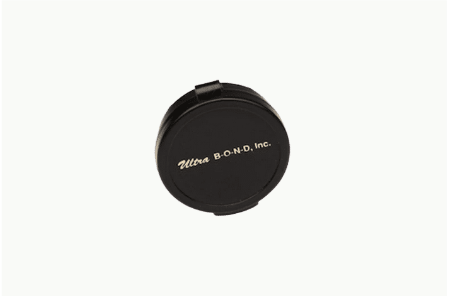 A black round object with the word nikon on it