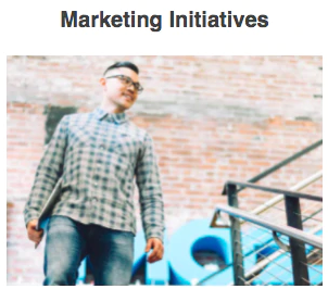A man walking down stairs with the words marketing initiatives on the bottom