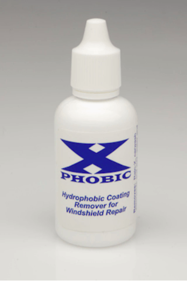 A bottle of hydrophobic coating remover for windshield repair