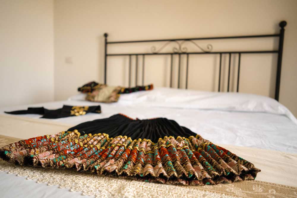 Casa Janna Entosa bedroom with wrought iron bed