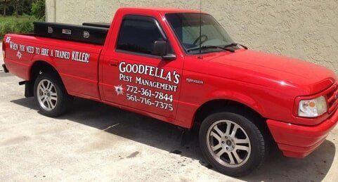 Red Exterminator Truck — Port St. Lucie, FL — Goodfella's Pest Management Inc Red Exterminator Truck — Port St. Lucie, FL — Goodfella's Pest Management Inc