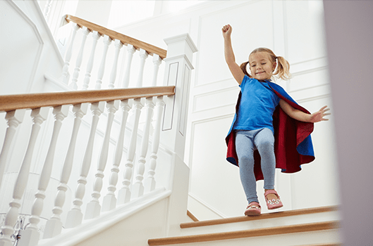 Girl Playing Game On Stairs - Family Medicine in Greenville, NC