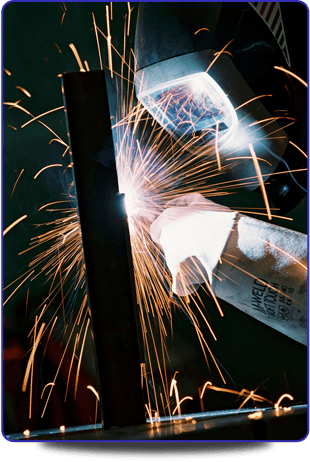 Covering the London, Surrey, Middlesex and Kent areas, call us on 01737 302097 A close-up of a welder.