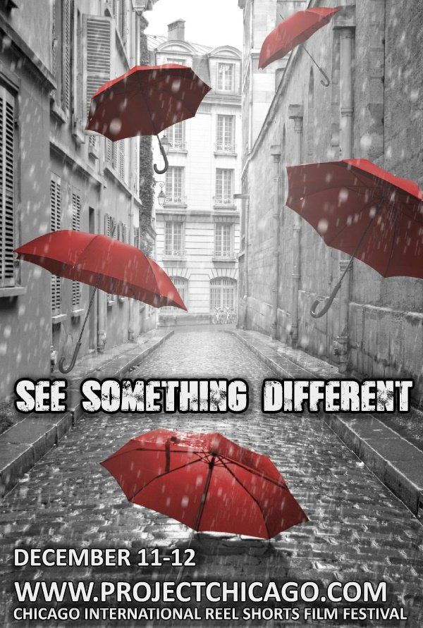 Red umbrellas float in black & white European alley.