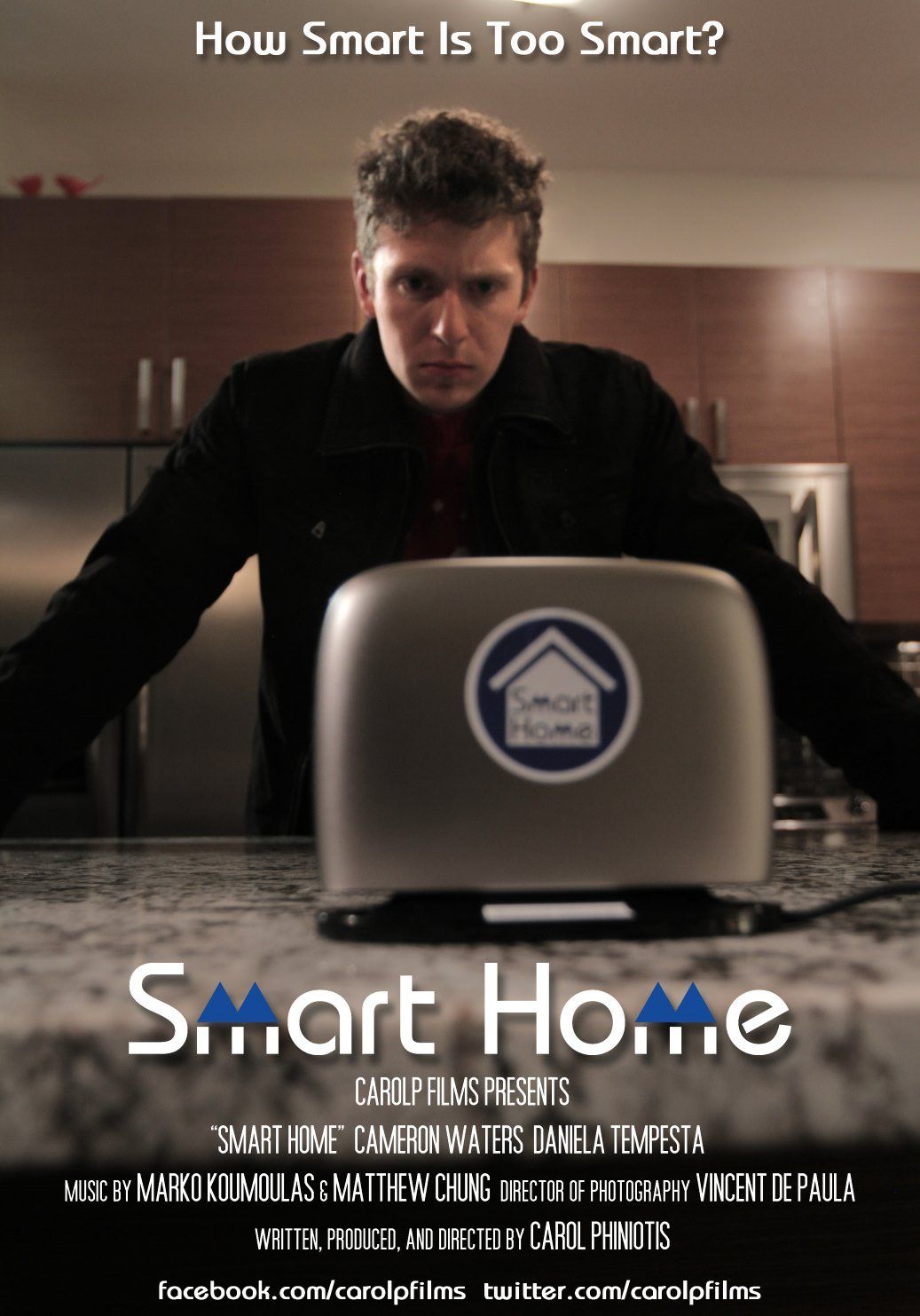 Man in kitchen, focused, in front of a toaster with a