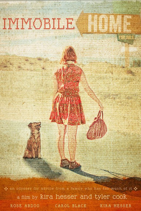 Woman in red dress stands by a dirt road with dog, holding a bag, desert in the background,