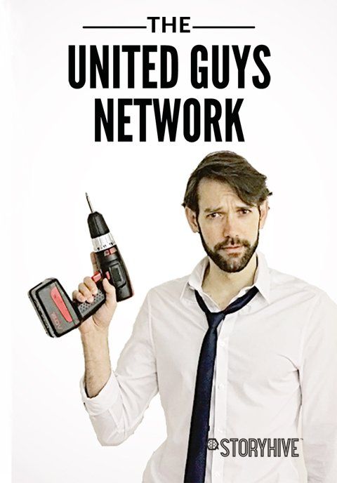 Man with a drill, tie askew, under