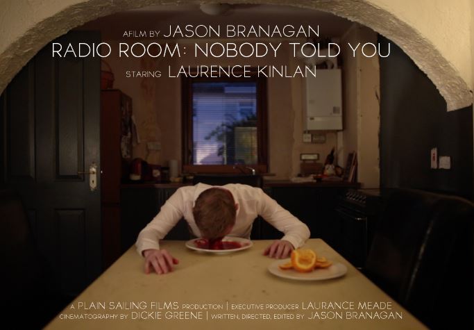 Film poster: Man leans over a table, face in red food. Interior room with text overlay.