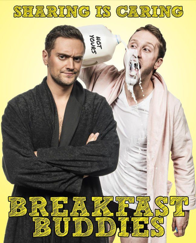 Two men in bathrobes; one pours milk on the other's face. Text: