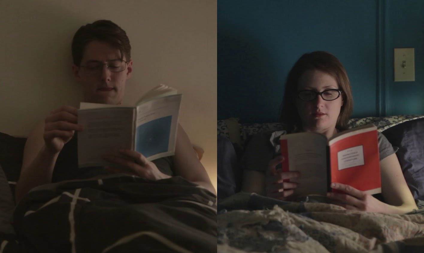 Two people reading in bed, one in a dark room, the other in a room with blue walls.