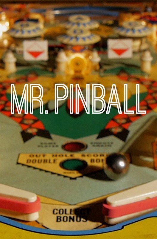 Close-up of pinball machine playfield with the text