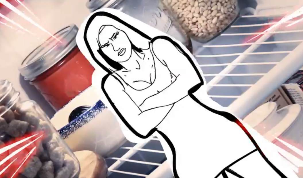 Woman with arms crossed, angry expression, in front of a refrigerator filled with food.