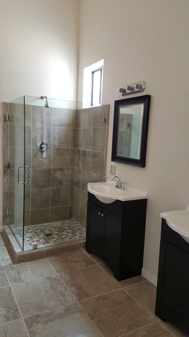 two disconnected bathroom sinks