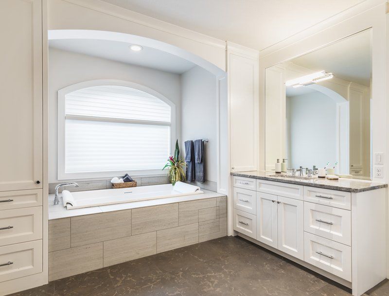 white bathroom with tub