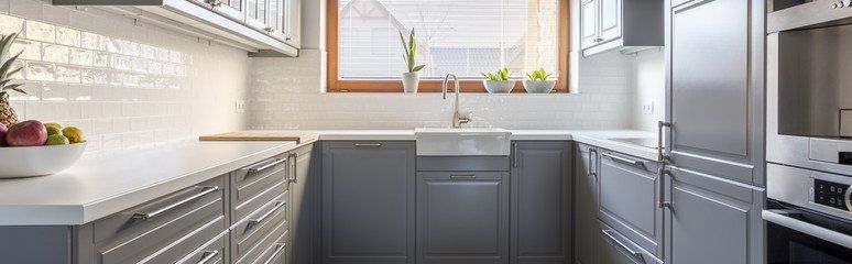 small blue grey and white kitchen